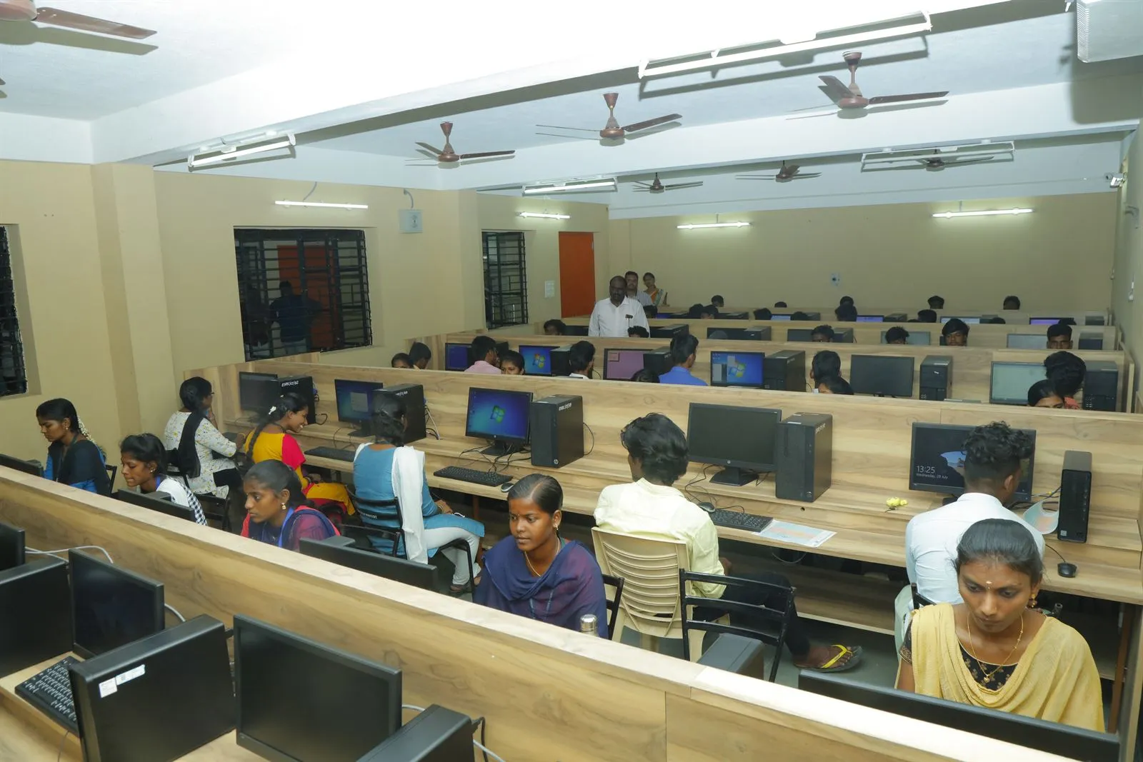 Students working at computers in the college computer lab