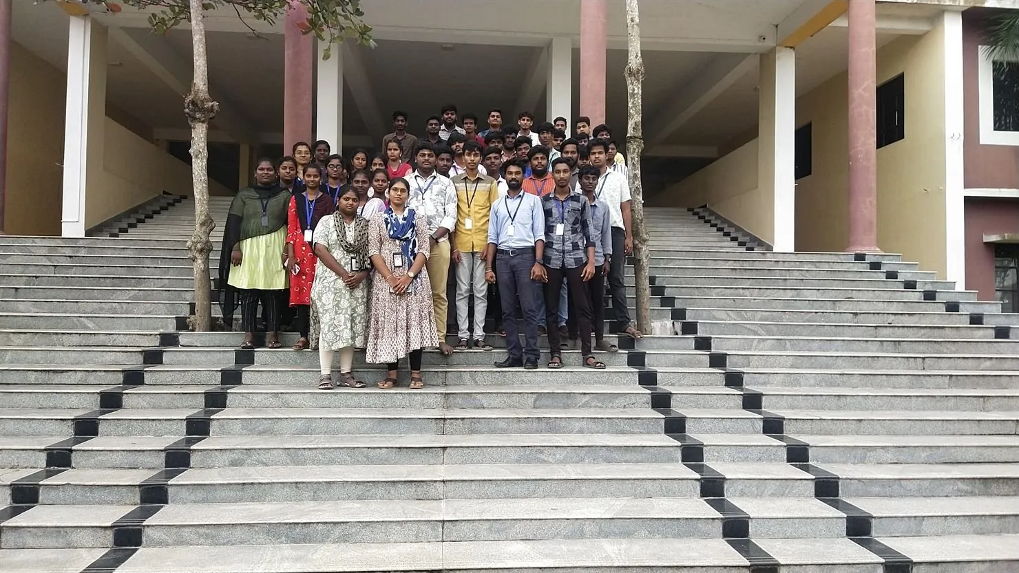 Students gathered on the steps of the main college building